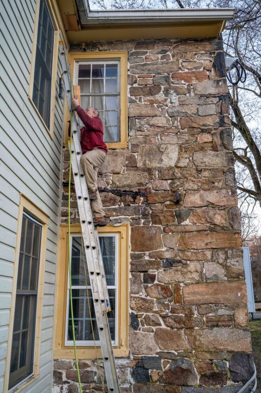 Local Stone Siding Repair pros at work
